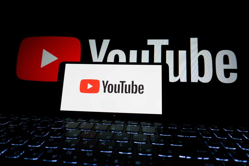 YouTube Logo on Laptop Screen