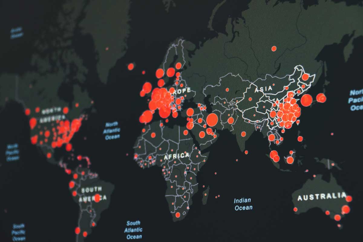 World map with black and red dots