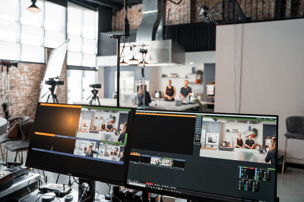 A dynamic setup in a video production studio with two monitors