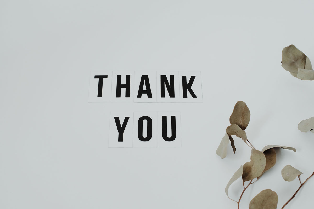 A minimalist thank you note with eucalyptus leaves, perfect for expressing gratitude